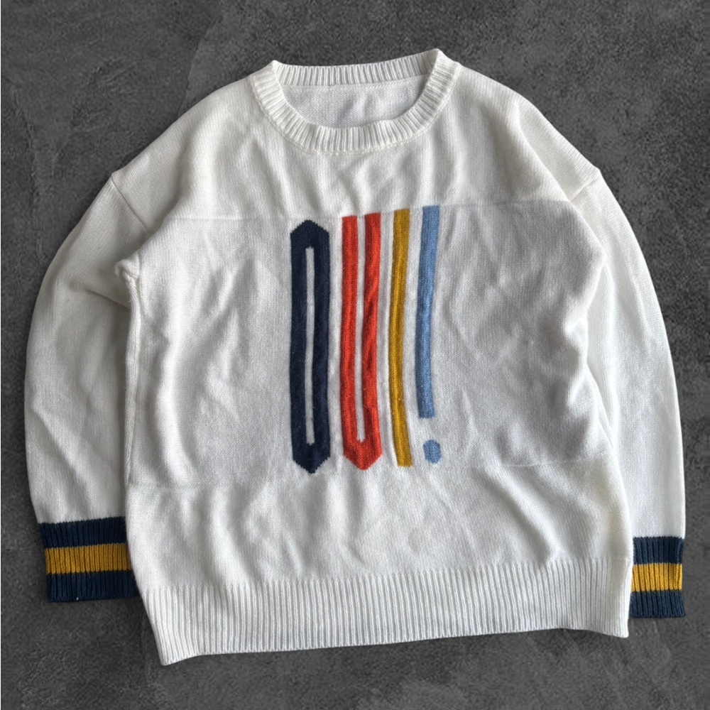Stylish Ivory Sweater with Bold Accents